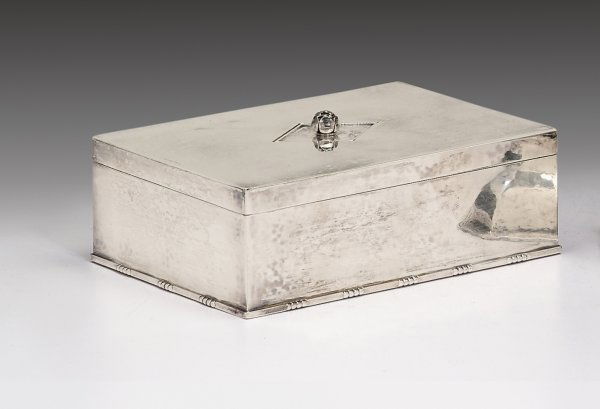 Georg Jensen sterling silver cigarette box, johan: Georg Jensen sterling silver cigarette box johan rohde, second quarter 20th century With a berried finial opening to a mahogany lined interior. H: 1 7/8 in, W: 5 3/4 in, D: 4 in. 16 oz.