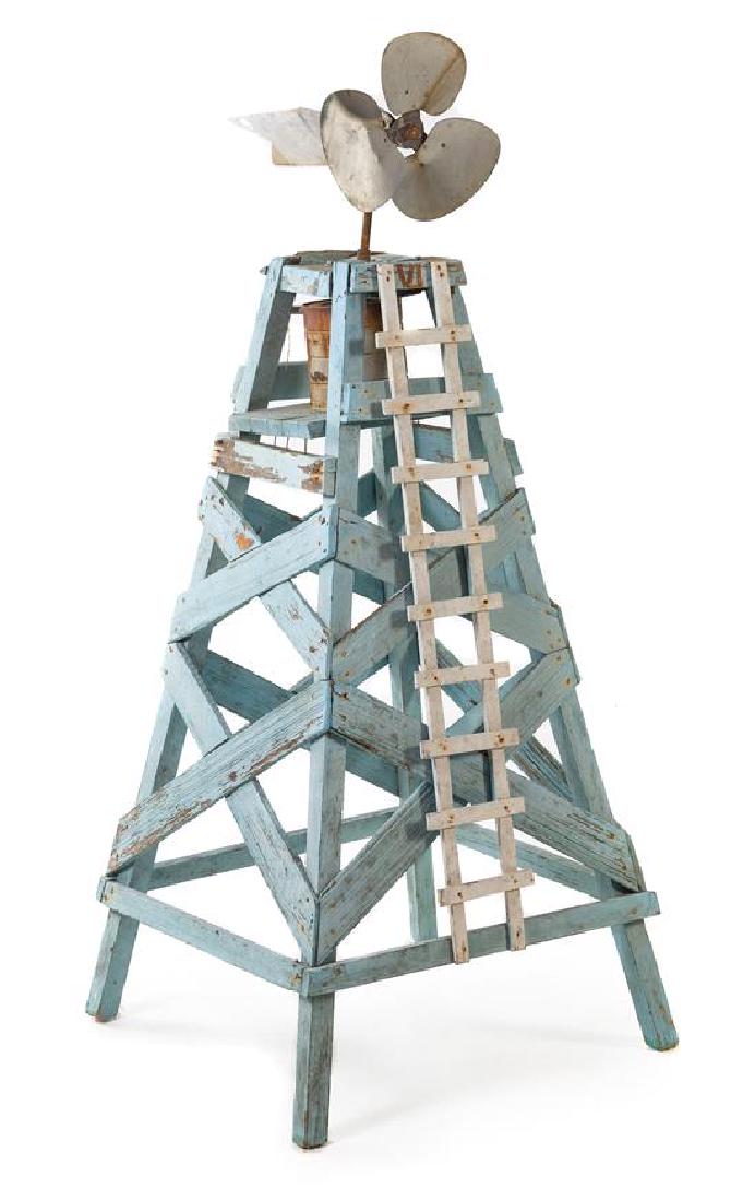 A Whimsical Blue-Painted Windmill Height 50 inches.: A Whimsical Blue-Painted Windmill Height 50 inches. Estimate $300-500