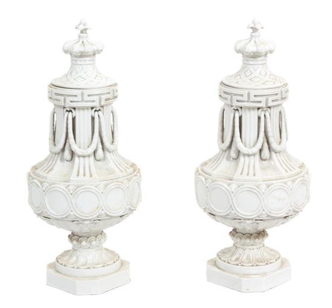 A Pair of Continental White Ceramic Covered Urns Height (1 of 1)