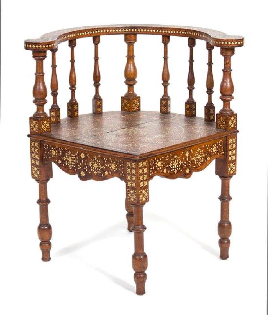 A Middle-Eastern Bone Inlaid Corner Chair Height 29: A Middle-Eastern Bone Inlaid Corner Chair 20th century Height 29 inches. Estimate $300-500