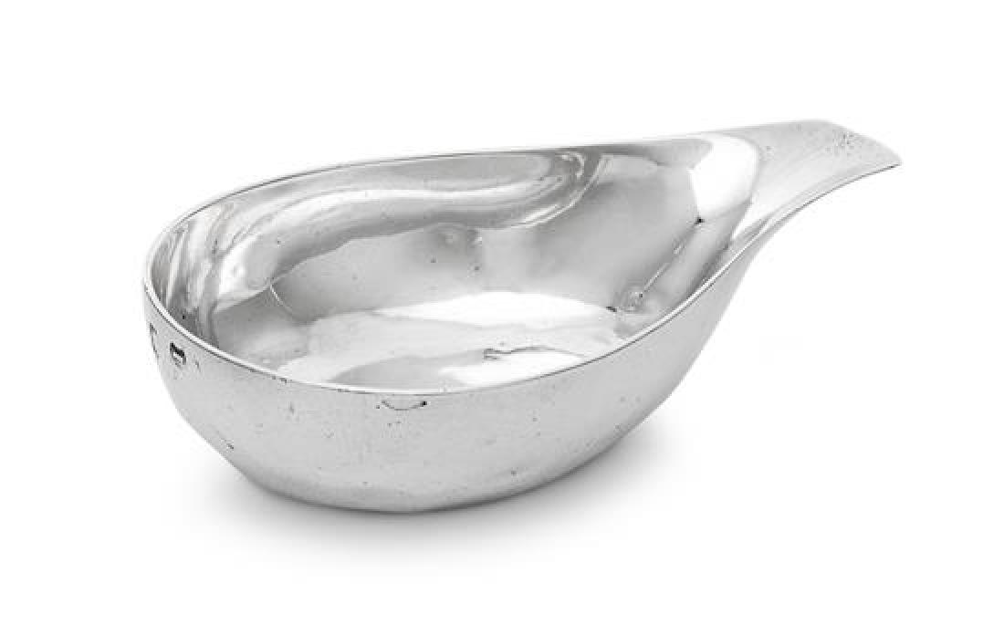 * A George II Silver Wine Taster, Maker's mark: * A George II Silver Wine Taster Maker's mark obscured, London, 1747 hallmarked on body exterior 1 ozt 14 dwts Width 4 3/8 inches. Estimate $150-250 Property from the Estate of William Lipton, New Yor