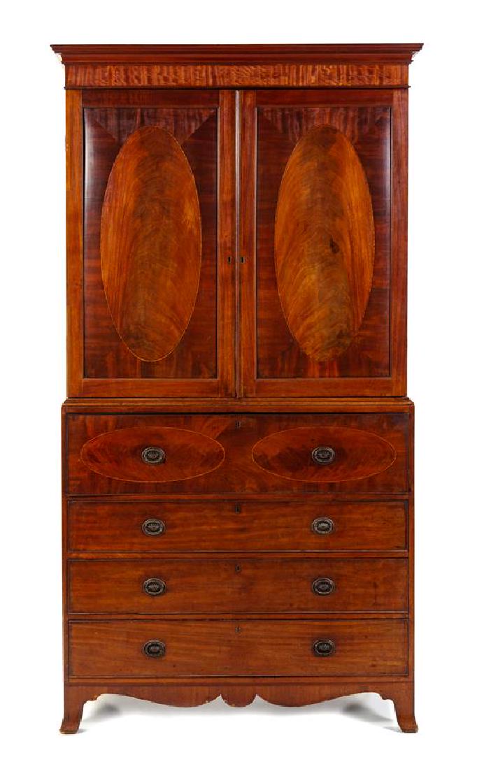 * A George III Mahogany Secretary Cabinet Height 93 x: * A George III Mahogany Secretary Cabinet 19th century the thumbmolded cornice above two fielded doors opening to slides, the lower section with a secretary drawer over three graduated drawers, raised