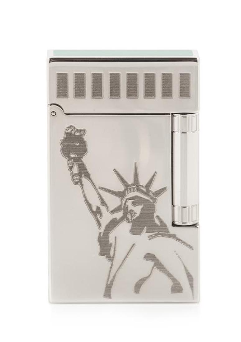 An S.T. Dupont State of Liberty Limited Edition Line 2: An S.T. Dupont State of Liberty Limited Edition Line 2 Palladium and Lacquer Pocket Lighter numbered 237/350, with a display box, outer box and accompanying documentation. Height 2 1/2 inches. Estimat