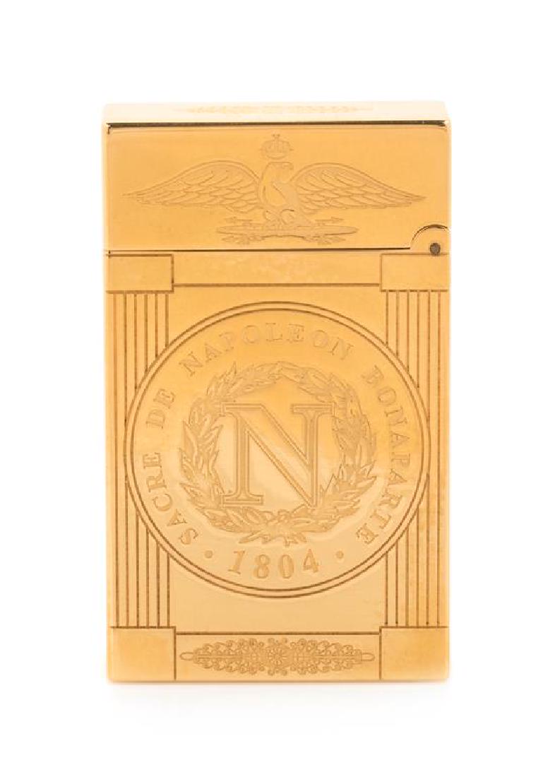 An S.T. Dupont Sacre de Napoleon Bonaparte Limited: An S.T. Dupont Sacre de Napoleon Bonaparte Limited Edition Line 2 Pocket Lighter numbered 691/1500, with a display box, outer box and accompanying documentation. Height 2 1/2 inches. Estimate $500-700