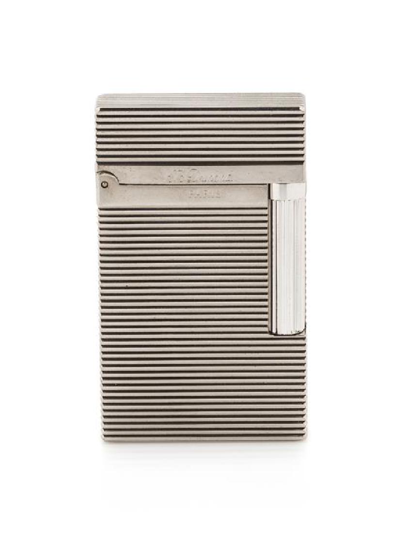 An S.T. Dupont Line 2 Lacquered Pocket Lighter Height 2: An S.T. Dupont Line 2 Lacquered Pocket Lighter having a banded case, the underside stamped 1A8UT08, with a display box, outer box and accompanying documentation. Height 2 1/2 inches. Estimate $300-500