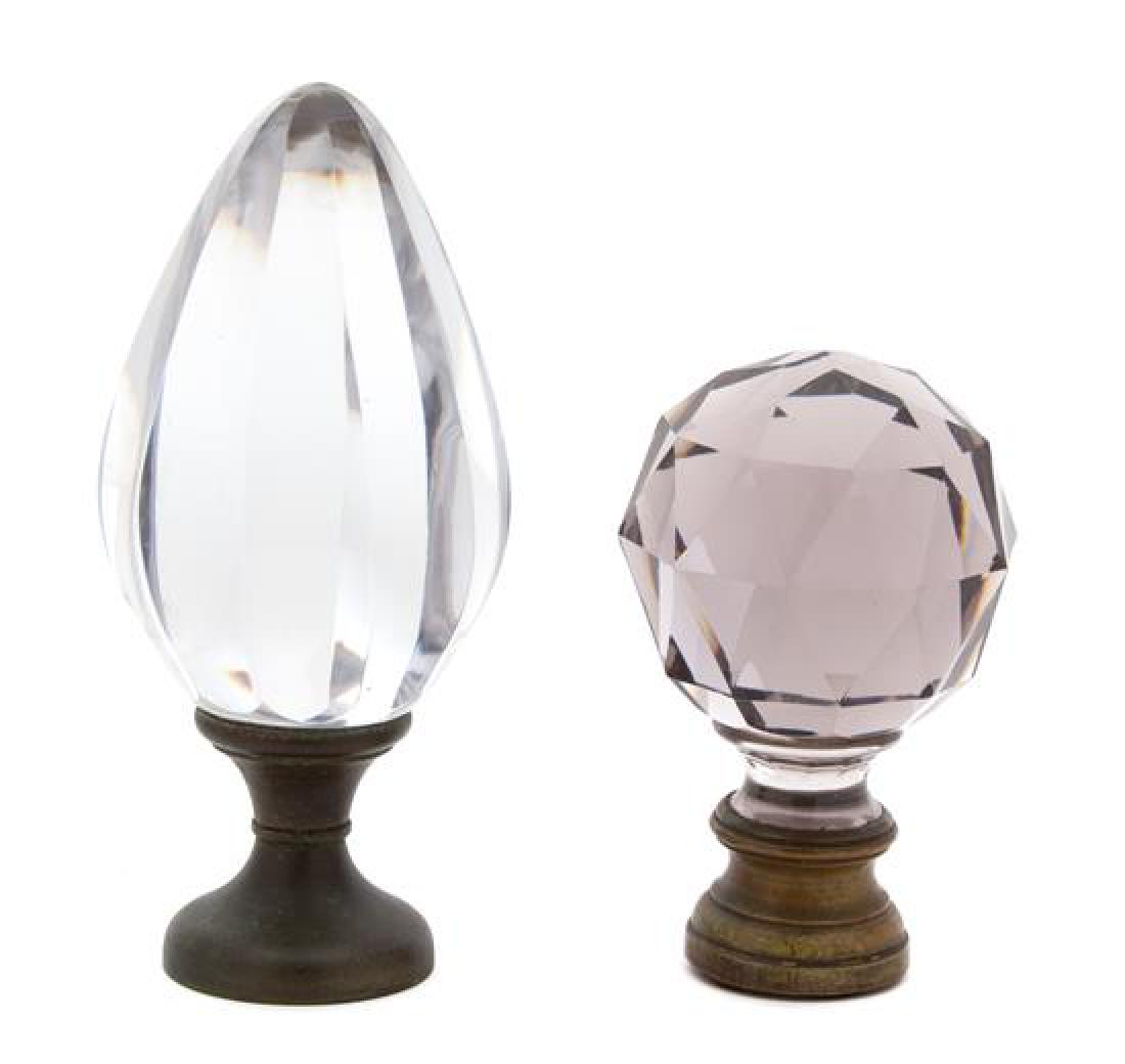 Two Continental Faceted Crystal Boules d'Escalier: Two Continental Faceted Crystal Boules d'Escalier 19th century mounted on brass bases. Height of taller 9 1/4 inches. Estimate $600-800 Property from the Collection of M. Anthony Greene, Atlanta, Geor