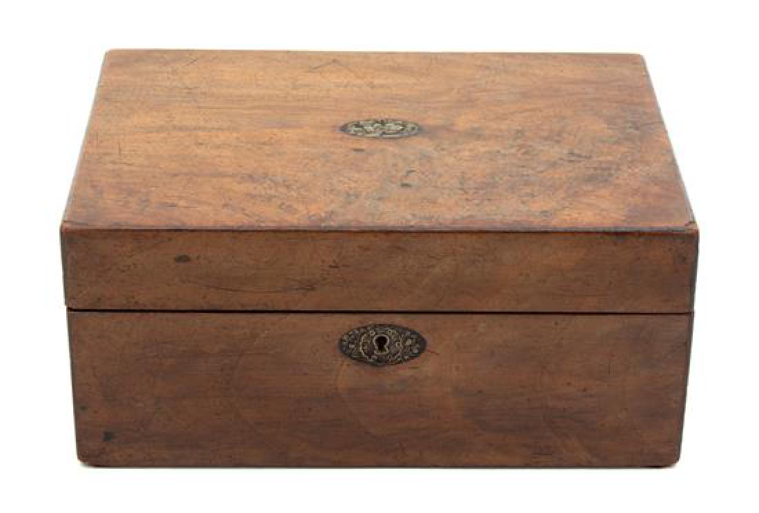 An English Burlwood Box Height 4 7/8 x width 10 3/4 x: An English Burlwood Box 19th century Height 4 7/8 x width 10 3/4 x depth 7 3/4 inches. Estimate $80-120 Property from the Collection of M. Anthony Greene, Atlanta, Georgia