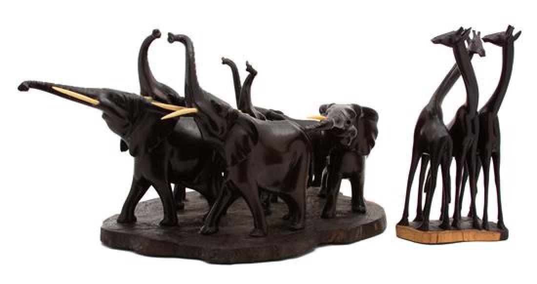 Two African Carved Wood Sculptures by John Musau (1 of 1)