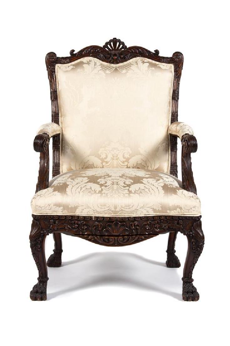 A George I Style Carved Mahogany Upholstered Open: A George I Style Carved Mahogany Upholstered Open Armchair 20th century having pale gold silk damask upholstery. Height 40 3/4 inches. Estimate $200-400 Property from the Collection of M. Anthony Gree