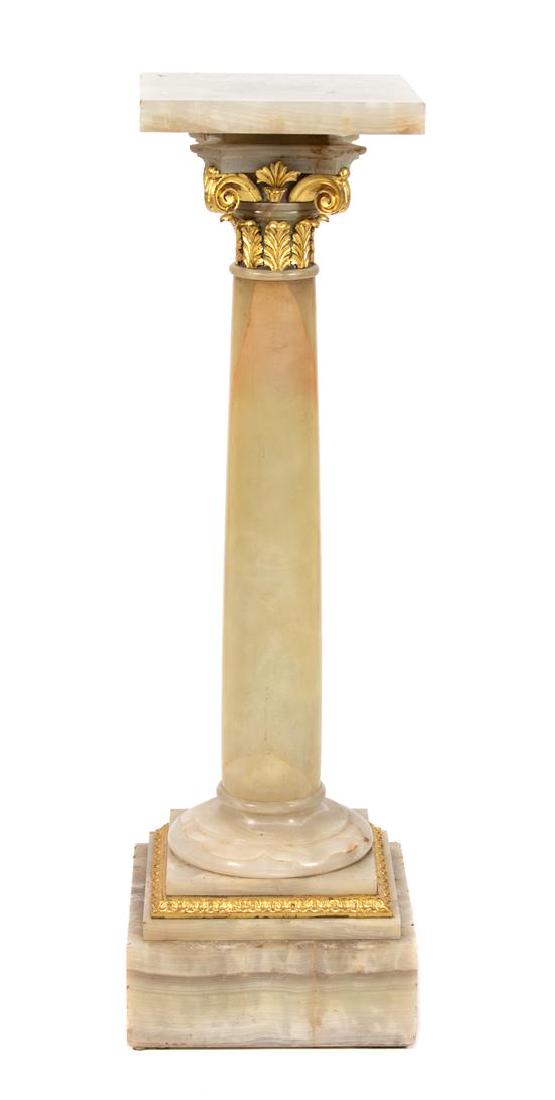 A Parcel-Gilt Onyx Pedestal Height 42 1/2 inches.: A Parcel-Gilt Onyx Pedestal 19th century Height 42 1/2 inches. Estimate $300-500 Property from the Collection of M. Anthony Greene, Atlanta, Georgia