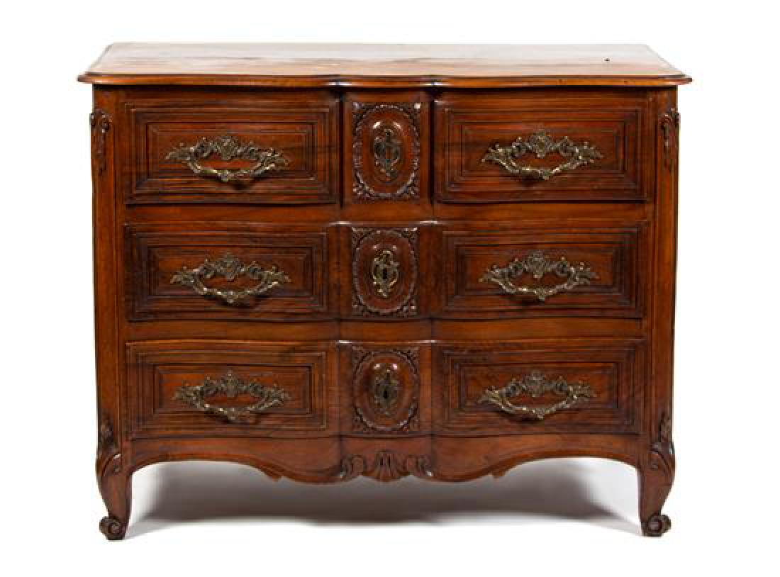 A Louis XV Provincial Style Carved Walnut Commode (1 of 1)