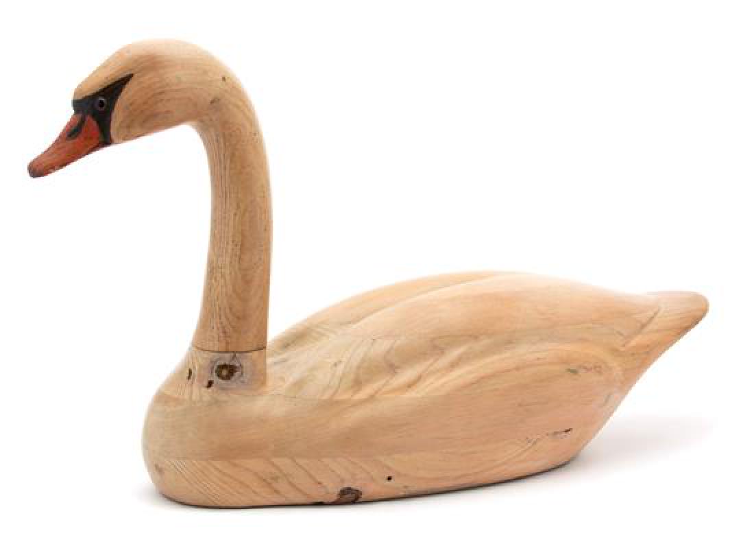 A Signed Tom Taber Painted and Carved Wood Swan Height: A Signed Tom Taber Painted and Carved Wood Swan 20th century Height 14 x length 25 inches. Estimate $100-200 Property from the Collection of M. Anthony Greene, Atlanta, Georgia