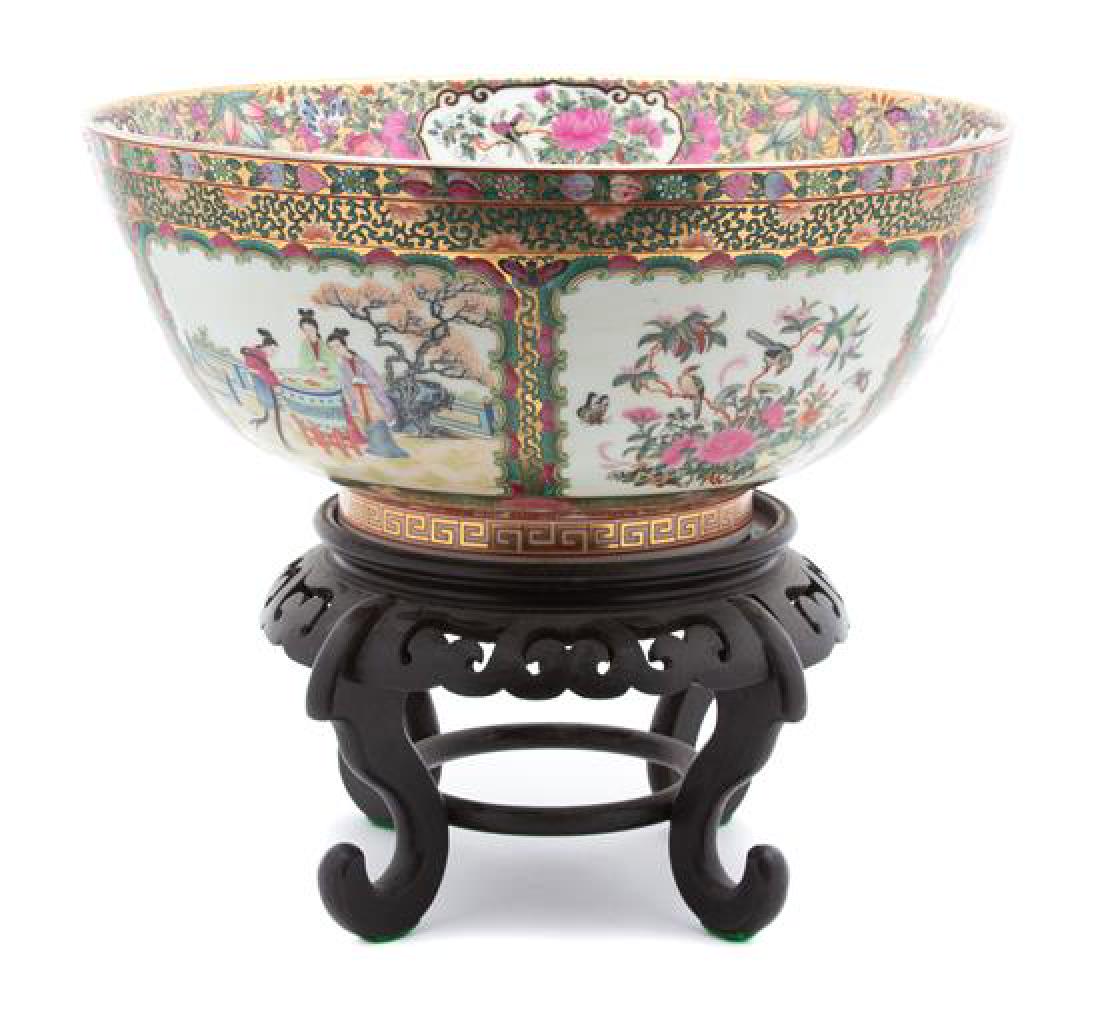 A Chinese Export Rose Medallion Porcelain Punchbowl: A Chinese Export Rose Medallion Porcelain Punchbowl 20th century on a fitted stand. Diameter 14 inches. Estimate $300-500 Property from the Collection of M. Anthony Greene, Atlanta, Georgia