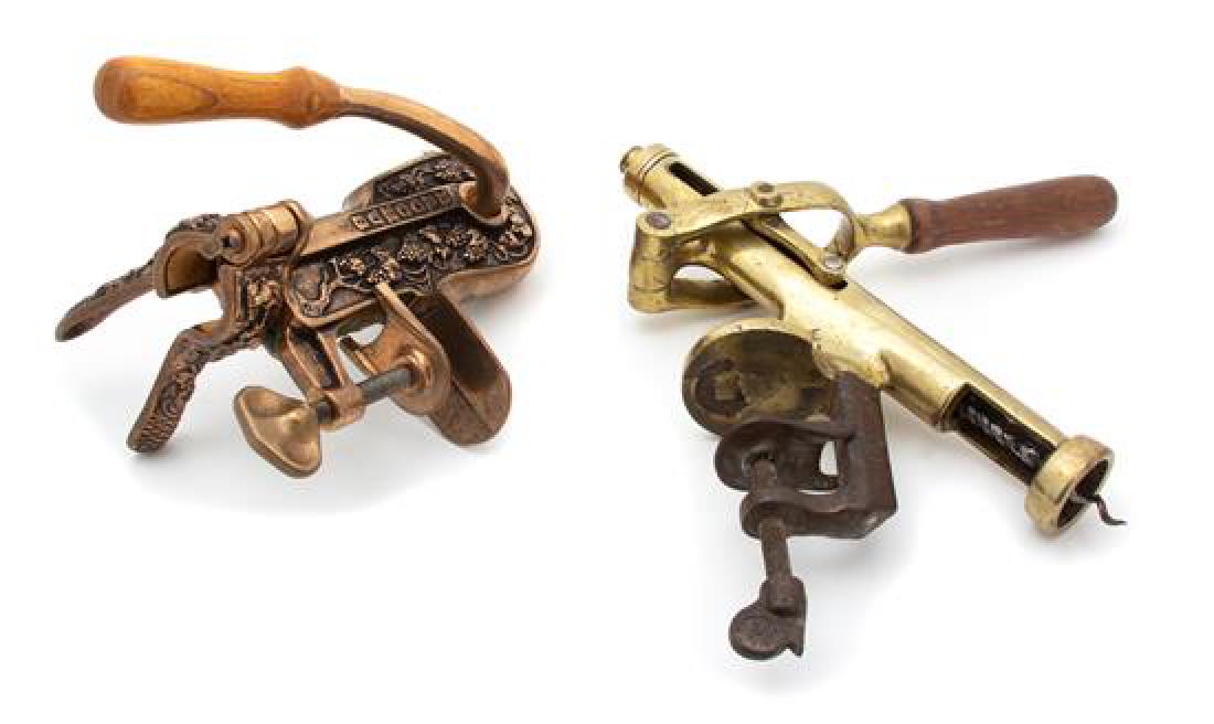 Two Continental Bronze and Iron Bottle Openers Height (1 of 1)