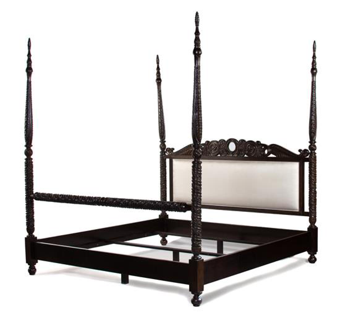 A Neoclassical Style Carved and Ebonized Four-Poster: A Neoclassical Style Carved and Ebonized Four-Poster Bed 20th century Height 94 3/4 x width 96 inches. Estimate $800-1,200
