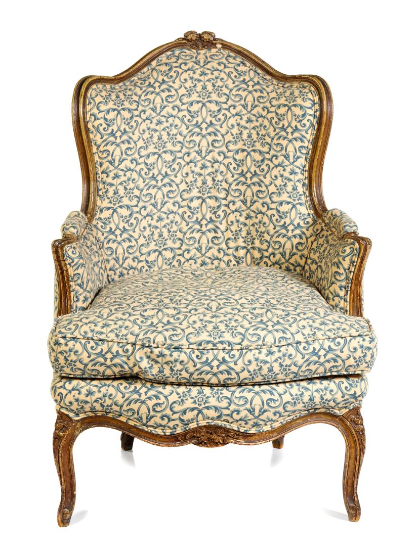 * A Louis XV Painted Bergere Height 40 inches.: * A Louis XV Painted Bergere 19th century the serpentine channel molded crest rail above the padded back, arms and cushion seat, raised on floral carved cabriole legs. Height 40 inches. Estimate $200-