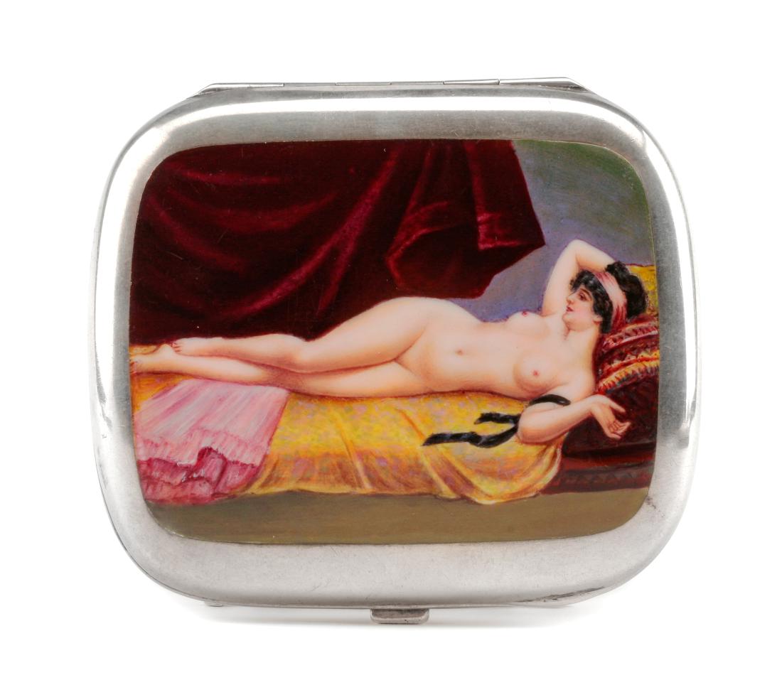 A German Enameled Silver Cigarette Case, Late: A German Enameled Silver Cigarette Case Late 19th/Early 20th Century the lid enameled to show a reclining nude, the underside with an engraved monogram. marked '.900' to interior case rim 3 ozt 17 dwt