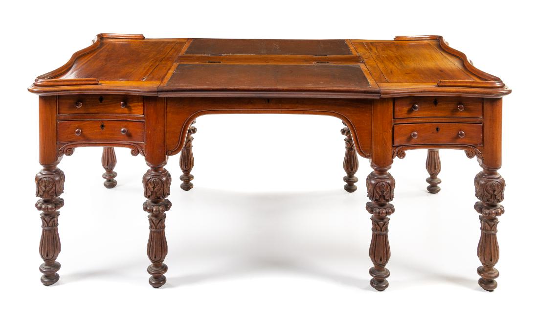 A Southeast Asian Colonial Teak Partners Desk Height 33: A Southeast Asian Colonial Teak Partners Desk Height 33 1/2 x width 75 1/2 x depth 44 1/2 inches. Estimate $1,000-2,000