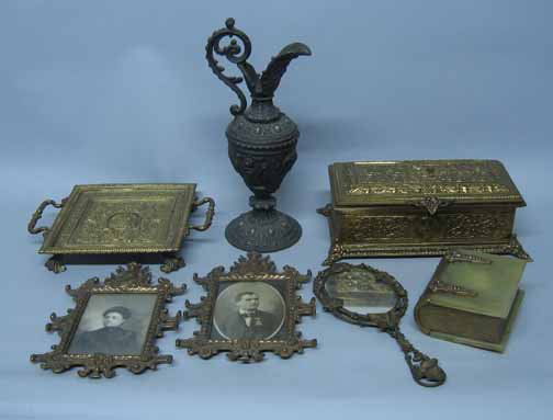Eight piece Brass Box and Decorative Metal Group i: Eight piece Brass Box and Decorative Metal Group i Including a decorative rectangular box, metal hand mirror, 2 photo frames, a mirrored tray, alabaster book form box and footed tray. H: of box 5 in.