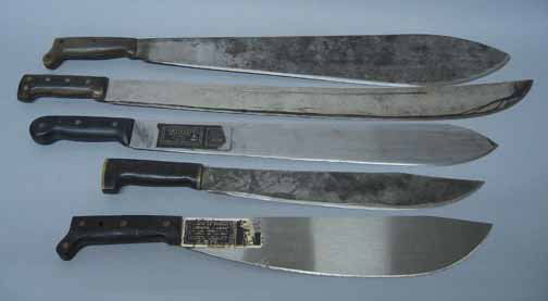 Five assorted machetes, , Including three made by: Five assorted machetes Including three made by Collins & Co., one with black plastic handle and leather sheath Blade: 18 in. the other with horn handle and pressed leather sheath and a wood handled wi