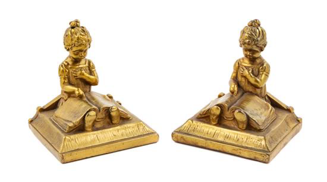 A Pair of Gilt Metal Bookends Height 6 1/2 inches. (1 of 1)