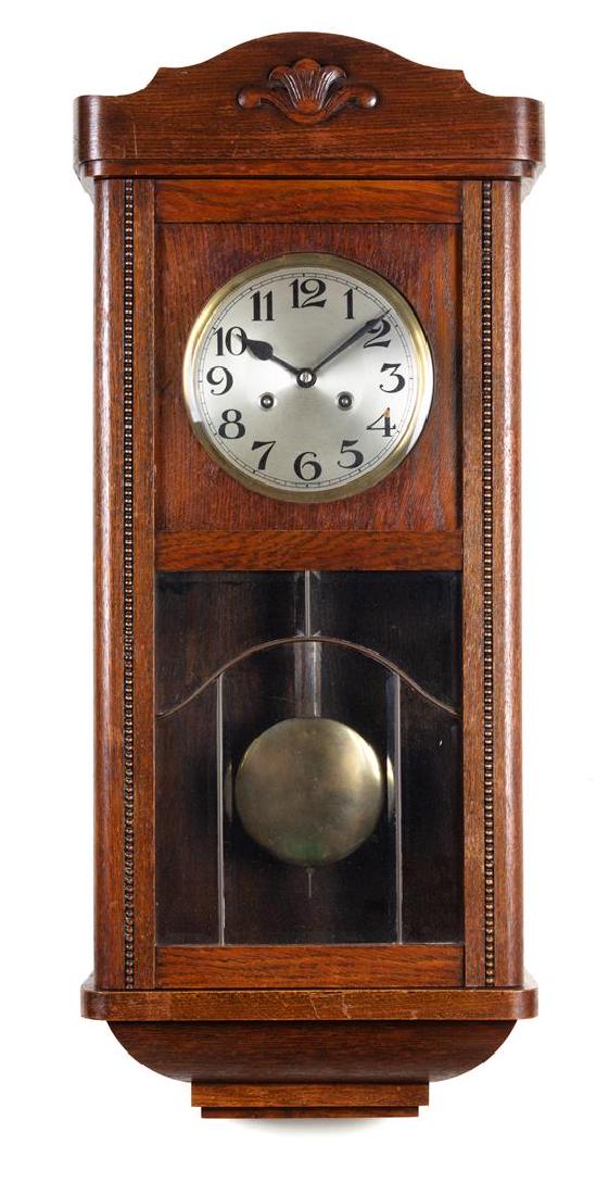 A Continental Wall Clock Height 28 inches. (1 of 1)