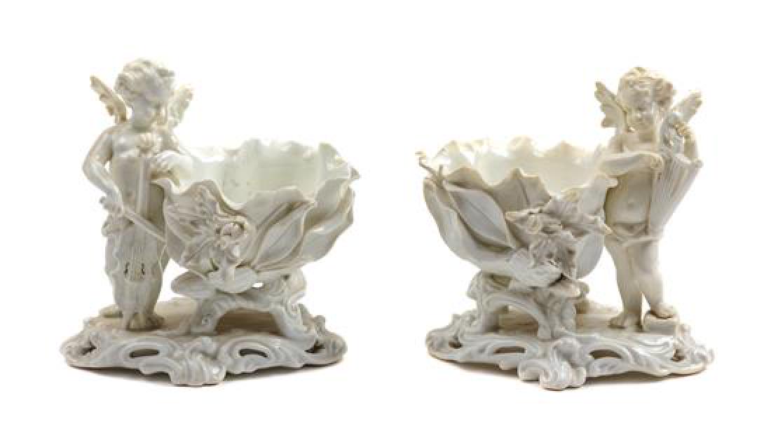 A Pair of Figural Compotes Height 6 3/4 inches. (1 of 1)