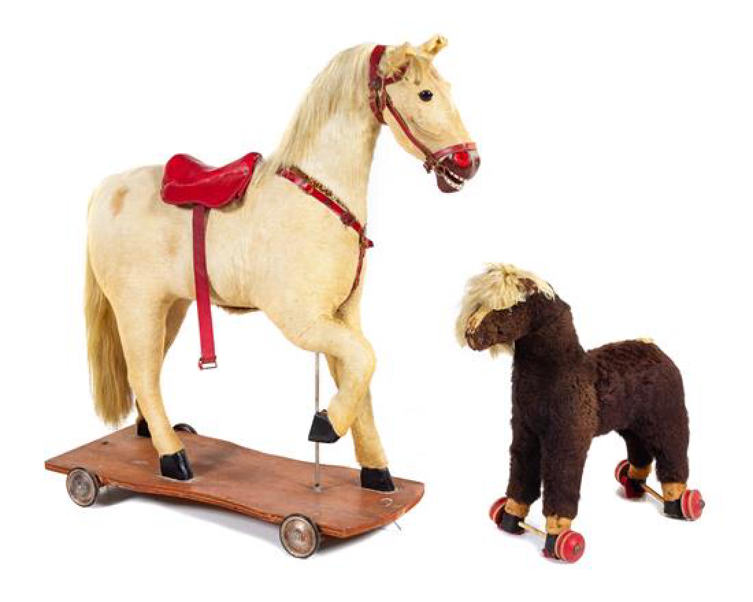 Two Hide Covered Horses Height of taller 42 inches. (1 of 1)