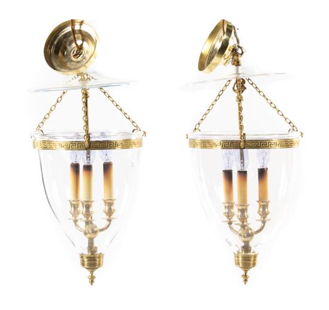 A Pair of Gilt Metal and Glass Hall Lanterns Height 22: A Pair of Gilt Metal and Glass Hall Lanterns of inverted bell form. Height 22 inches. Estimate $100-200