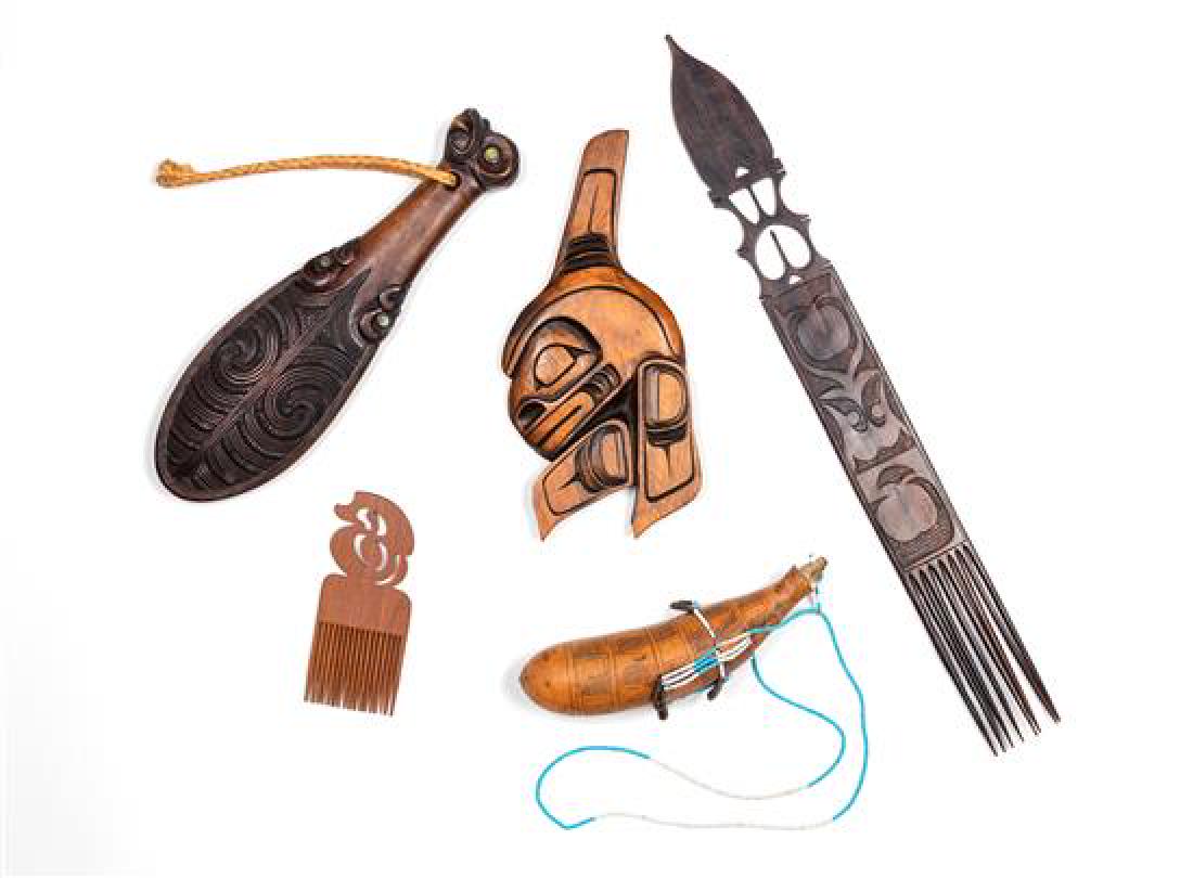 Collection of Ethnographic Articles Various sizes.: Collection of Ethnographic Articles consisting of two Pre-Colombian stone faces and three walrus bone carvings. Various sizes. Estimate $100-200