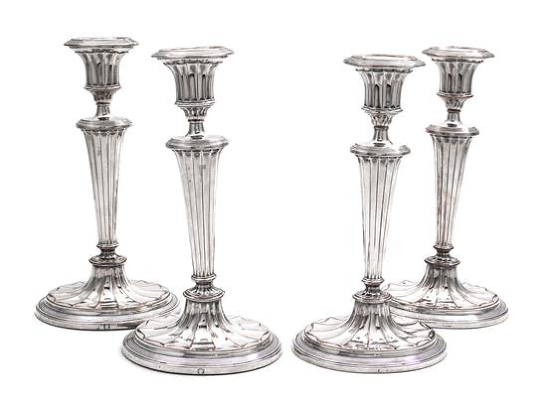 A Set of Four English Silver-Plate Candlesticks, (1 of 2)