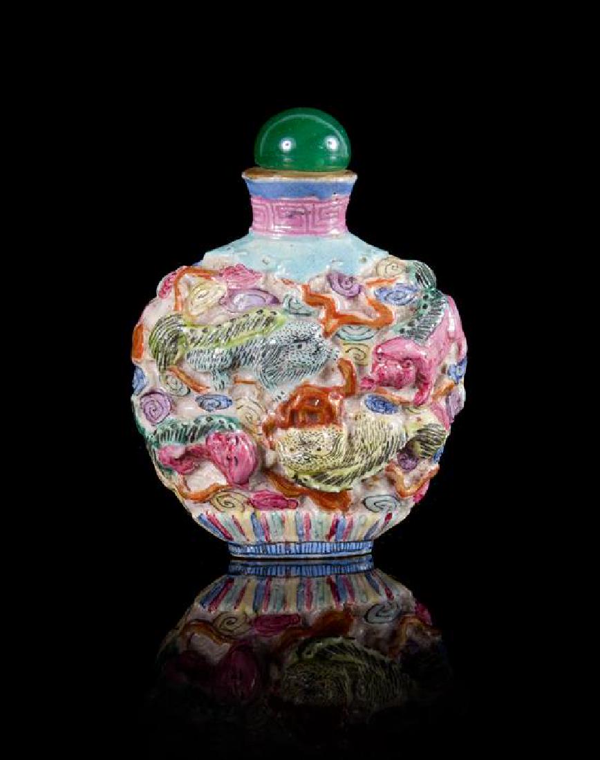 * A Molded Famille Rose Porcelain Snuff Bottle Height 3 (1 of 1)