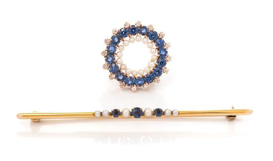 A Collection of Edwardian Yellow Gold, Sapphire and: A Collection of Edwardian Yellow Gold, Sapphire and Gemstone Brooches consisting of a circle brooch containing 16 round mixed cut sapphires measuring approximately 3.10 mm in diameter, 16 old mine cut