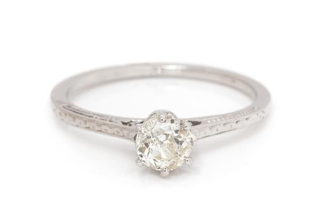An 18 Karat White Gold and Diamond Solitaire Ring, 1.20: An 18 Karat White Gold and Diamond Solitaire Ring, containing one old European cut diamond weighing approximately 0.50 carat. Stamp: 18K. 1.20 dwts. Estimate $300-500 Diamond Characteristics (graded i