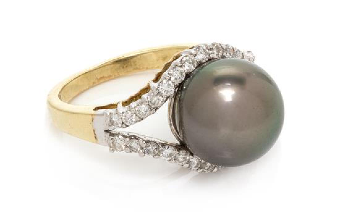 A 14 Karat Bicolor Gold, Cultured Tahitian Pearl and: A 14 Karat Bicolor Gold, Cultured Tahitian Pearl and Diamond Ring, containing one pearl measuring approximately 11.10 mm in diameter and 30 round brilliant cut diamonds weighing approximately 0.45 car