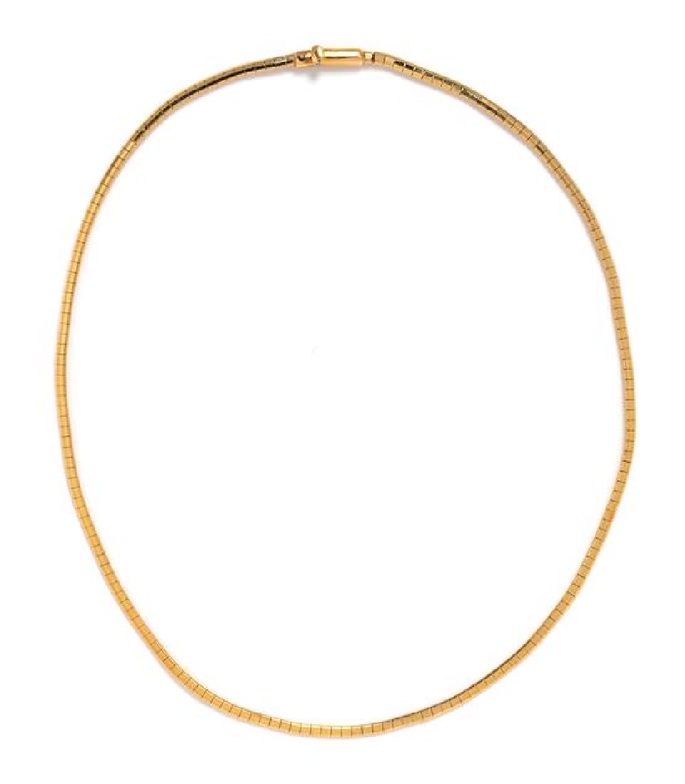 A 14 Karat Yellow Gold Omega Link Necklace, Italian,: A 14 Karat Yellow Gold Omega Link Necklace, Italian, measuring approximately 2.50 mm wide. Stamp: K14 ITALY. 8.70 dwts. Estimate $200-300