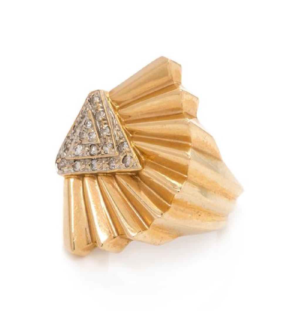 * A 14 Karat Yellow Gold and Diamond Fan Motif Ring,: * A 14 Karat Yellow Gold and Diamond Fan Motif Ring, Erte, containing 23 round brilliant cut diamonds weighing approximately 0.12 carat total. Stamp: CFA 14K 113/500. 5.70 dwts. Estimate $400-600 Prop