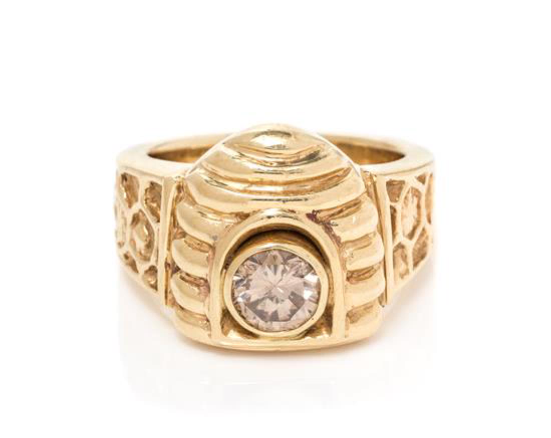 A 14 Karat Yellow Gold and Colored Diamond Beehive: A 14 Karat Yellow Gold and Colored Diamond Beehive Motif Ring, Lise Bennett for Unicorn Designs, containing one round brilliant cut colored diamond (origin of color not tested) weighing approximately 