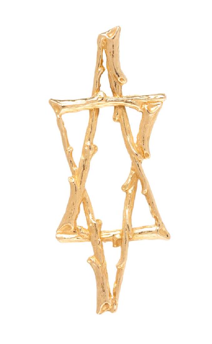 A Yellow Gold Star Pendant, 8.10 dwts.: A Yellow Gold Star Pendant, designed as textured gold twigs arranged as a star pendant. 8.10 dwts. Estimate $100-200