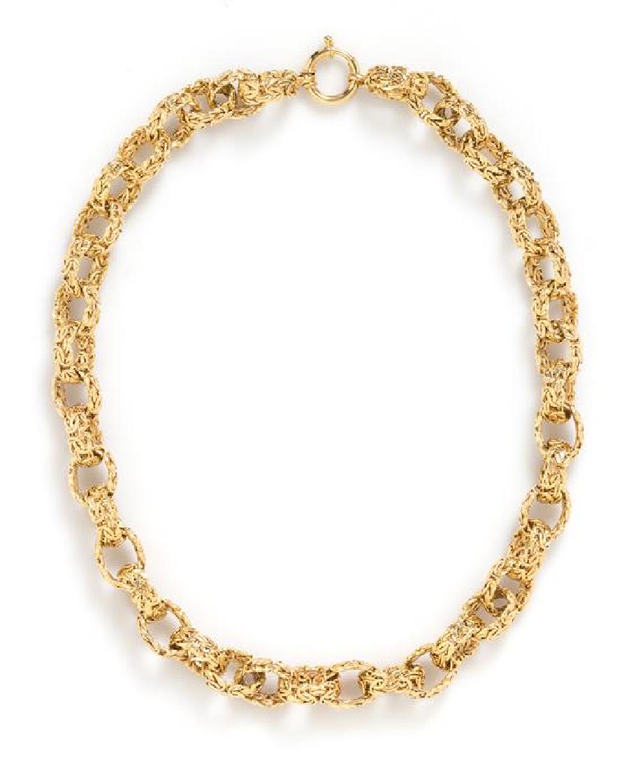 *A 14 Karat Yellow Gold Byzantine Chain Oval Link: *A 14 Karat Yellow Gold Byzantine Chain Oval Link Necklace, consisting of oval link construction of flat Byzantine chain measuring approximately 11.00 mm wide. Stamp: AK 14K TURKEY. 23.30 dwts. Estima