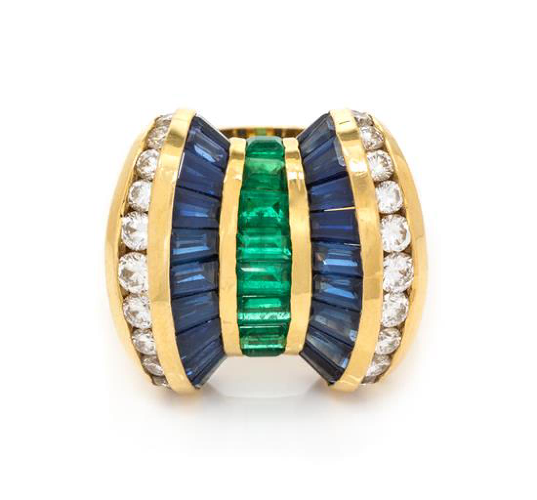 An 18 Karat Yellow Gold, Sapphire, Emerald and Diamond: An 18 Karat Yellow Gold, Sapphire, Emerald and Diamond Ring, Charles Krypell, containing 22 calibre cut sapphires, eight calibre cut emeralds, and 30 round brilliant cut diamonds weighing approximatel