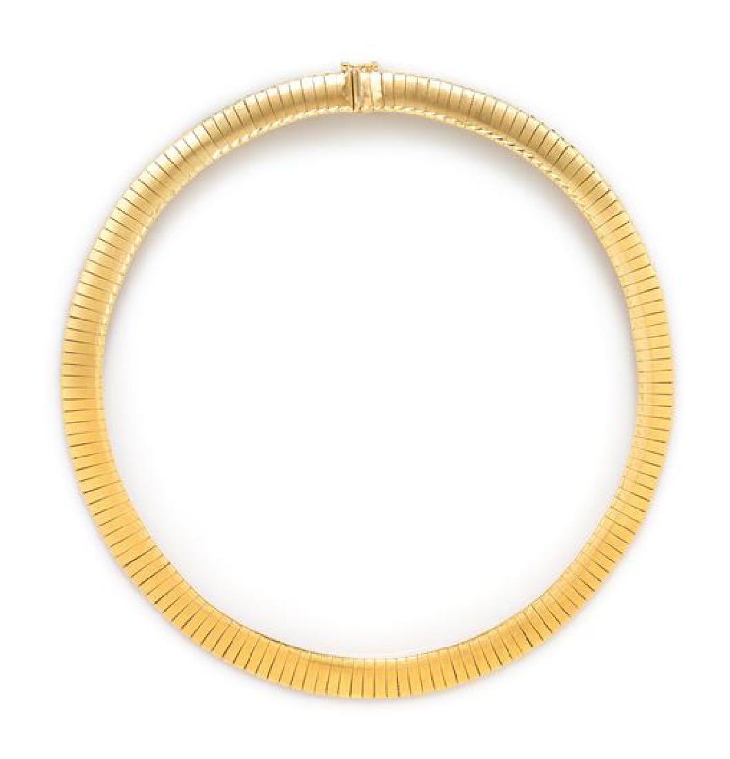 An 18 Karat Yellow Gold Omega Necklace, 31.50 dwts.: An 18 Karat Yellow Gold Omega Necklace, measuring approximately 10.20 mm wide. Stamp: 750 1.314. 31.50 dwts. Estimate $800-1,200