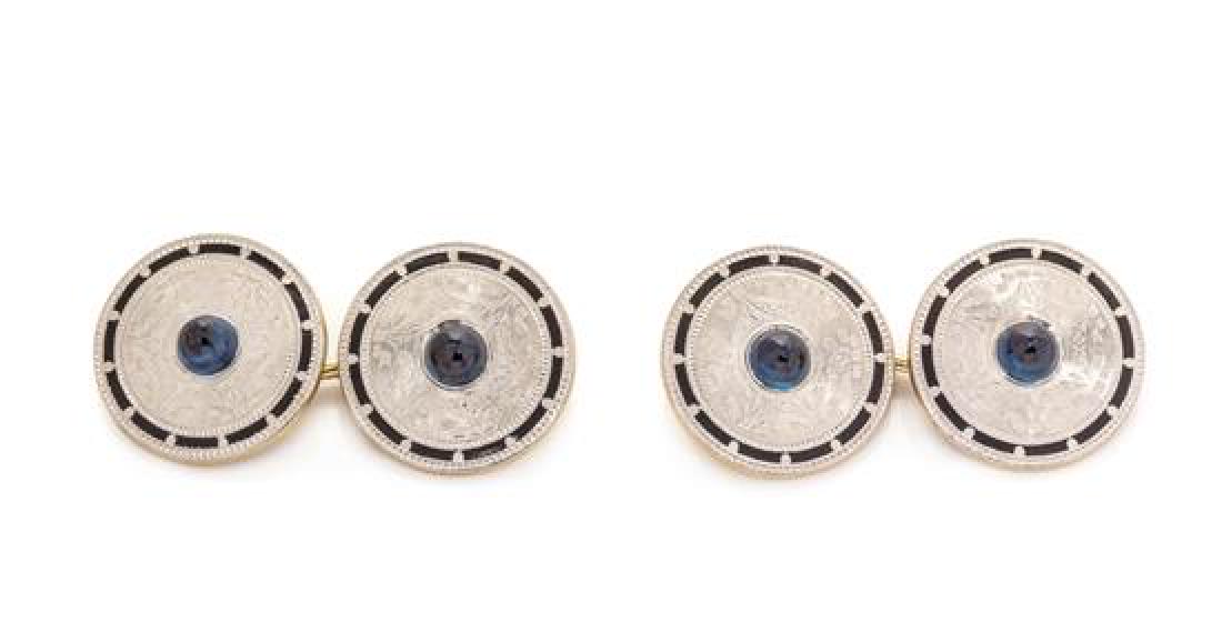 A Pair of Edwardian Platinum Topped Yellow Gold,: A Pair of Edwardian Platinum Topped Yellow Gold, Synthetic Sapphire and Enamel Cufflinks, Wordley, Allsopp & Bliss, with engraved foliate designs, containing four bullet shape cabochon cut synthetic s