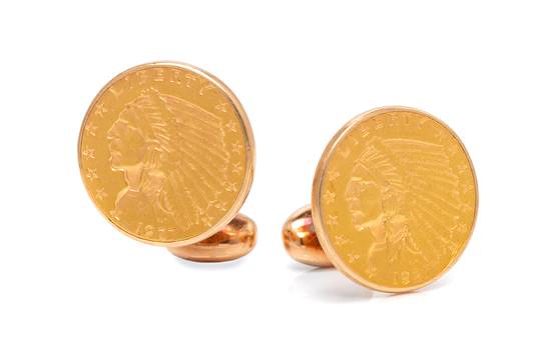 * A Pair of 14 Karat and US Liberty Head Coin: * A Pair of 14 Karat and US Liberty Head Coin Cufflinks, containing two $2.50 Liberty Indian Head gold coins, dated 1927, in yellow gold settings. Stamp: 14K. 8.70 dwts. Estimate $300-500 Property fro