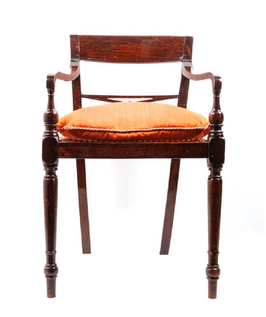 English 19th Century Mahogany Dwarf Open Armchair: English 19th Century Mahogany Dwarf Open Armchair with pierced X-form backsplat, caned seat on turned tapered cylindrical front legs. Height 23 1/2 x width 15 x depth 13 3/4 inches Estimate $100-200 P