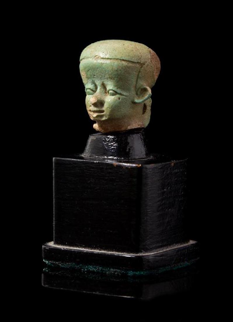 * An Egyptian Faience Head of Pataikos Height 3/4 (1 of 1)