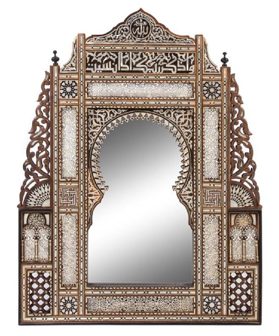 A Pair of Moorish Mother-of-Pearl Inlaid Mirrors Height: A Pair of Moorish Mother-of-Pearl Inlaid Mirrors 20th century inlaid throughout to show geometric decoration and inscriptions. Height 34 x width 26 3/8 inches. Estimate $1,500-2,000