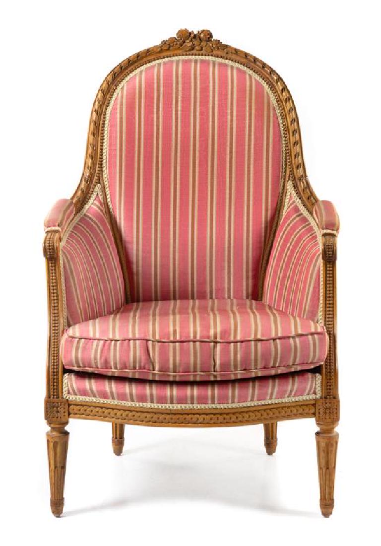 * A Louis XVI Style Fruitwood Bergere Height 41 inches.: * A Louis XVI Style Fruitwood Bergere 19th century with Clarence House upholstery. Height 41 inches. Estimate $500-700 Property from the Collection of Graham Carpio, Chicago, Illinois