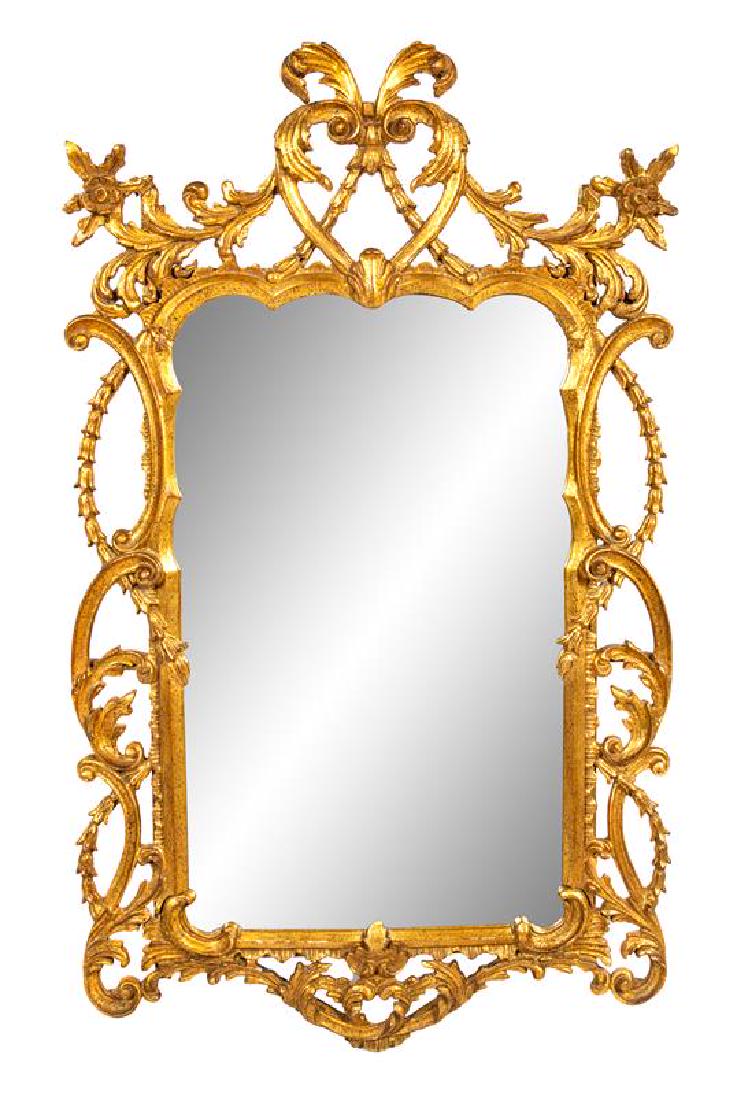 An Italian Giltwood Mirror Height 47 x width 28 inches. (1 of 1)