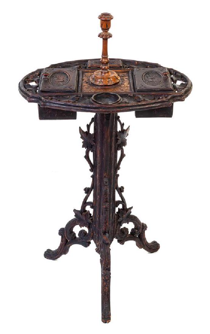 A Black Forest Carved Smoking Stand Height 35 inches. (1 of 2)